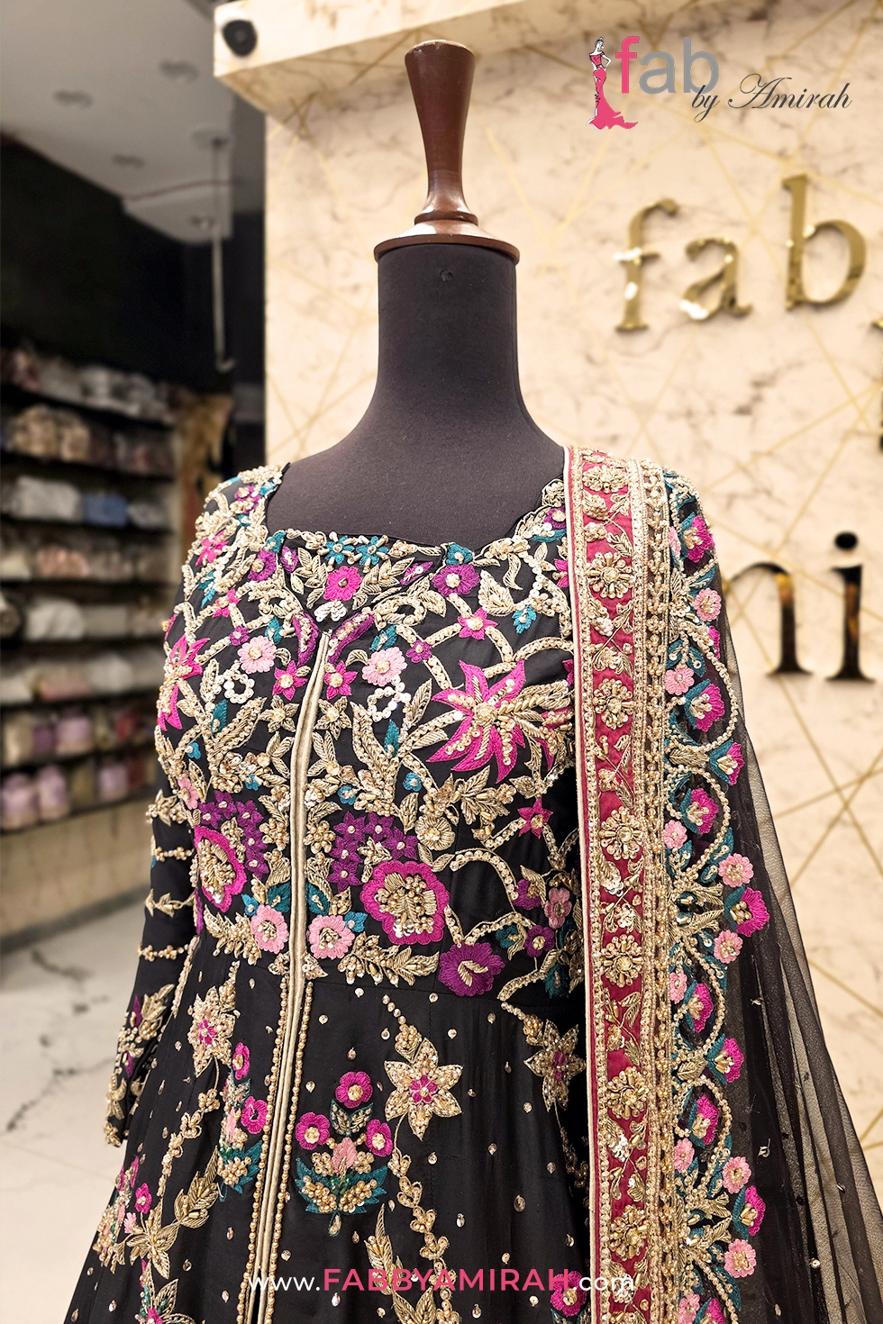 Close-up of intricate Kora work on black bridal maxi