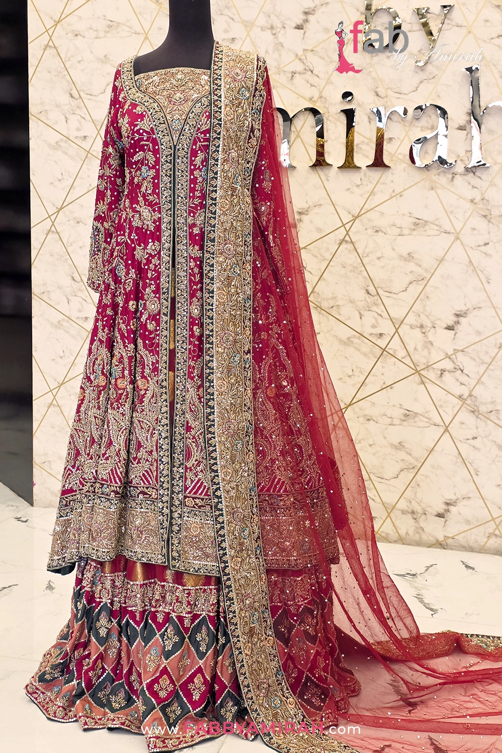 Intricate hand-stitched needlework on premium raw silk bodice dress