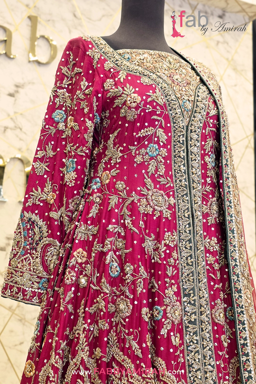 Intricate hand-stitched needlework on premium raw silk bodice dress