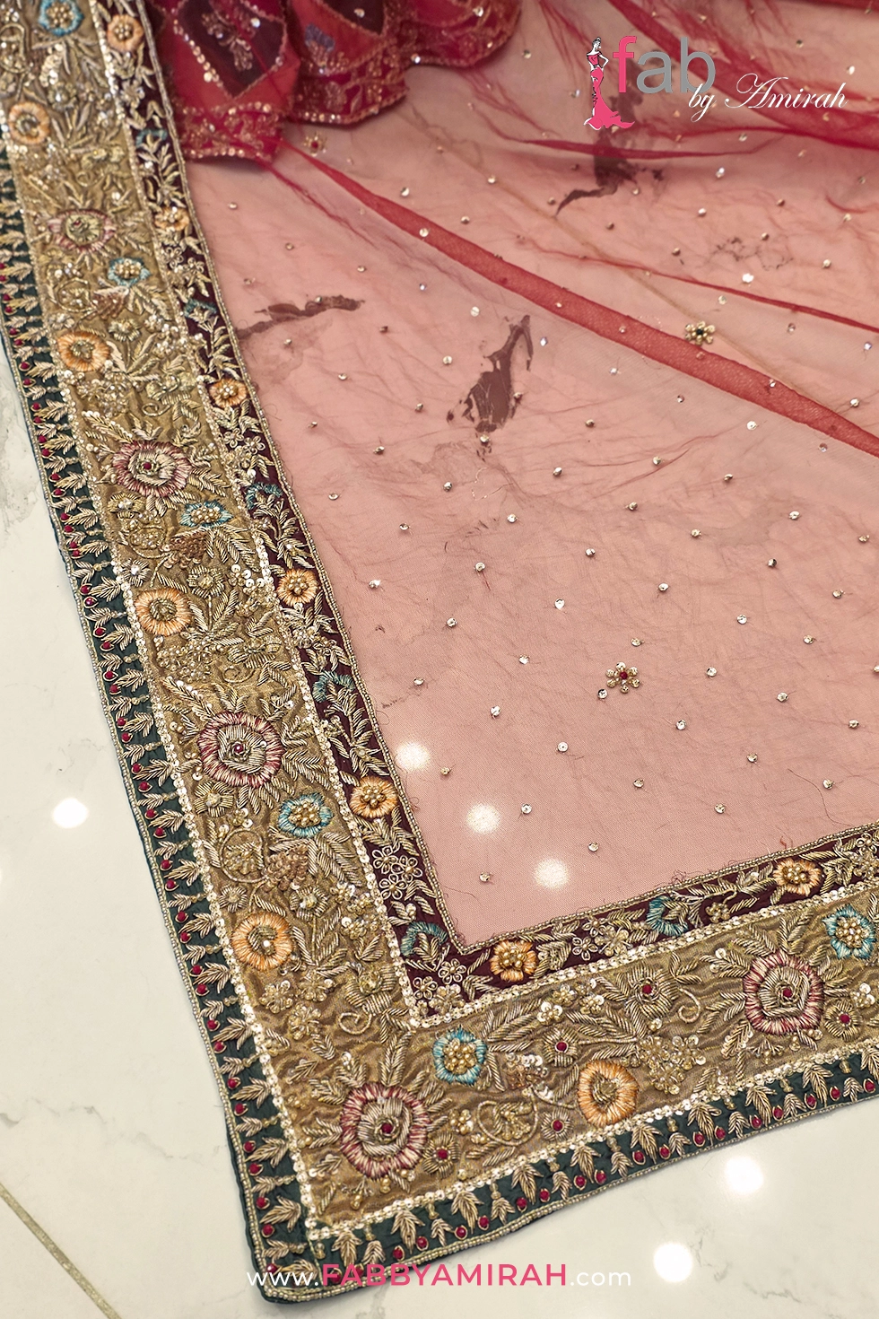 Close-up of premium tulle net dupatta with heavy borders
