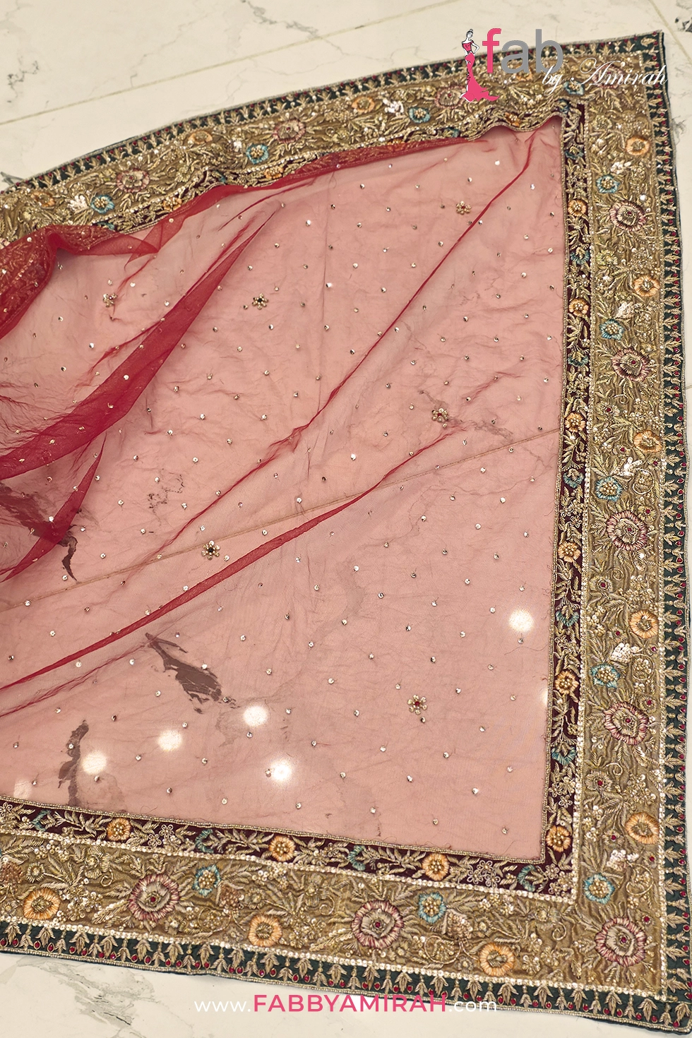 Close-up of premium tulle net dupatta with heavy borders
