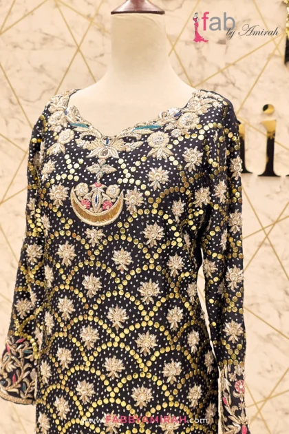 Regal black outfit with heavy kora by Fab By Amirah