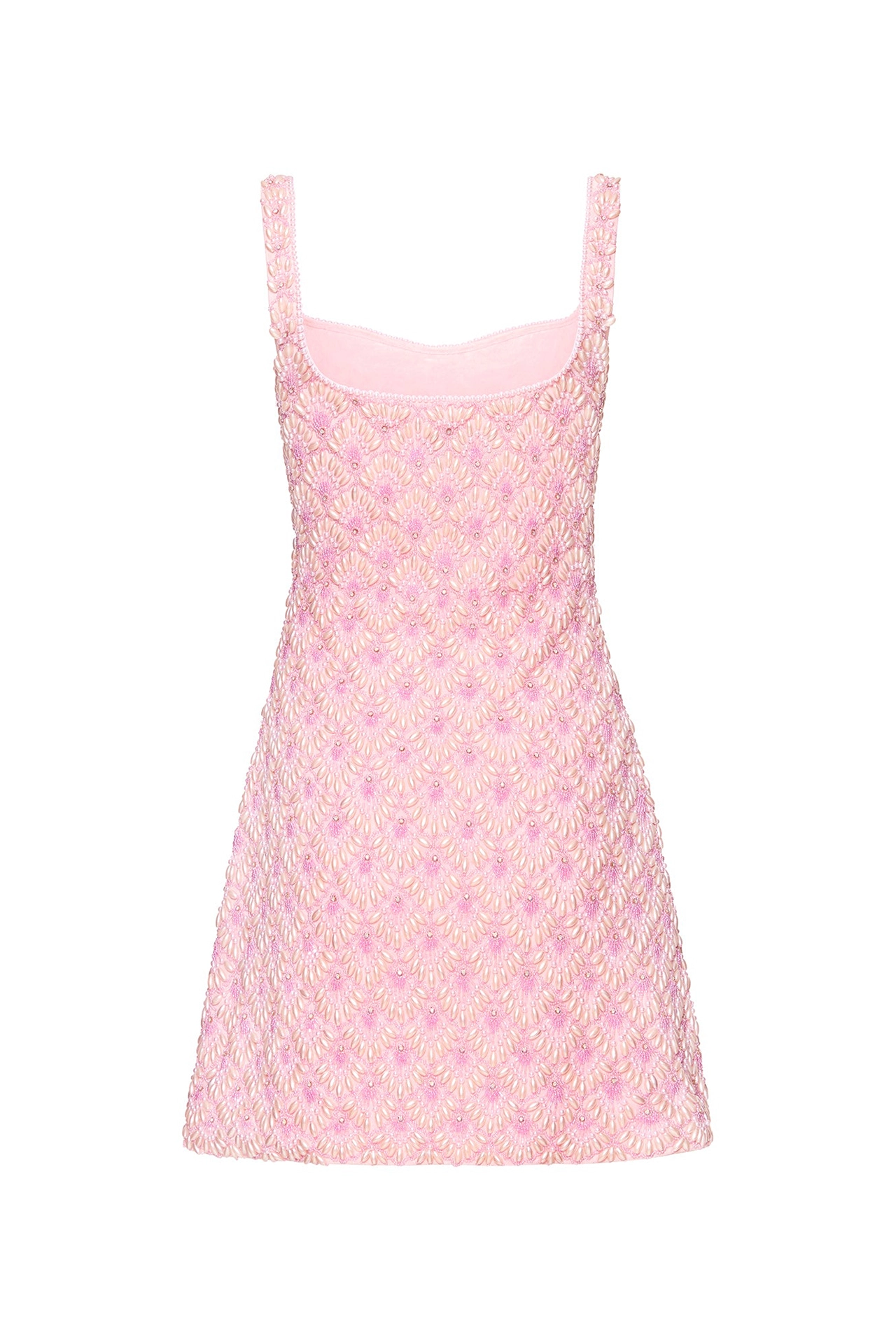 Back of rose pink mini dress fabric showing hand-embroidered seashell shapes