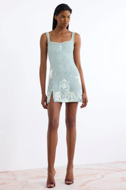 Luxury beaded party mini dress in arctic blue on model front view