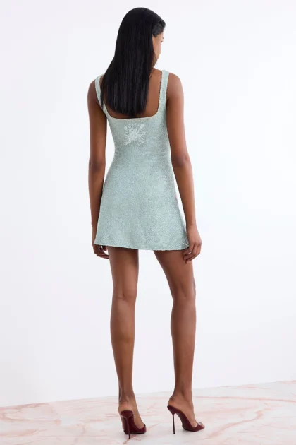 Luxury beaded party mini dress back view showing wide straps and clean zip closure