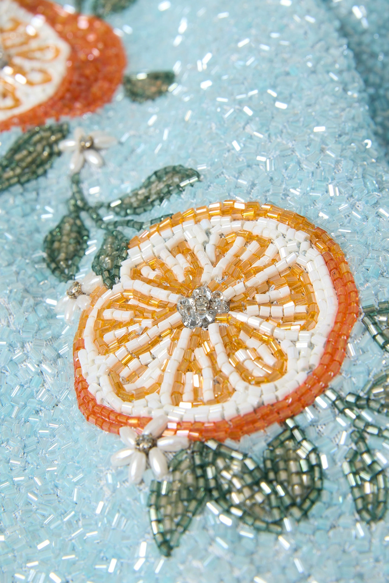 Close-up of fruit beads and pearl flowers from Capri Gown