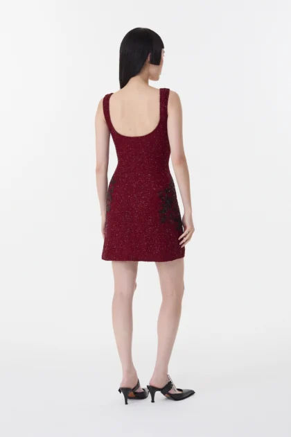 Low scoop back view of garnet red short dress with premium lining
