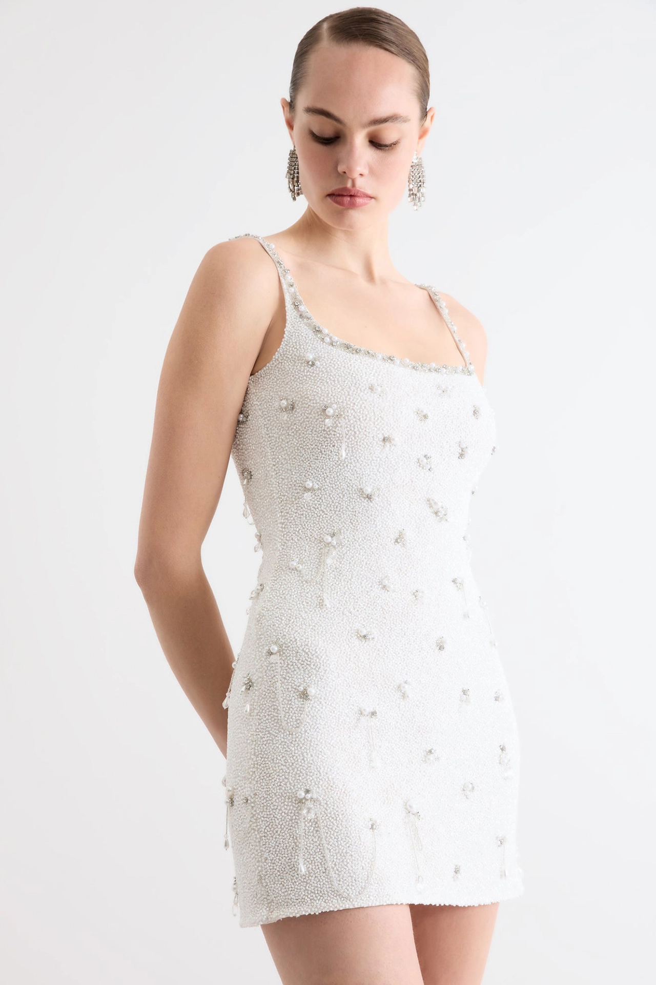 Close-up of ivory dress with crystal droplets on mesh from Droplet Mini Mannequin