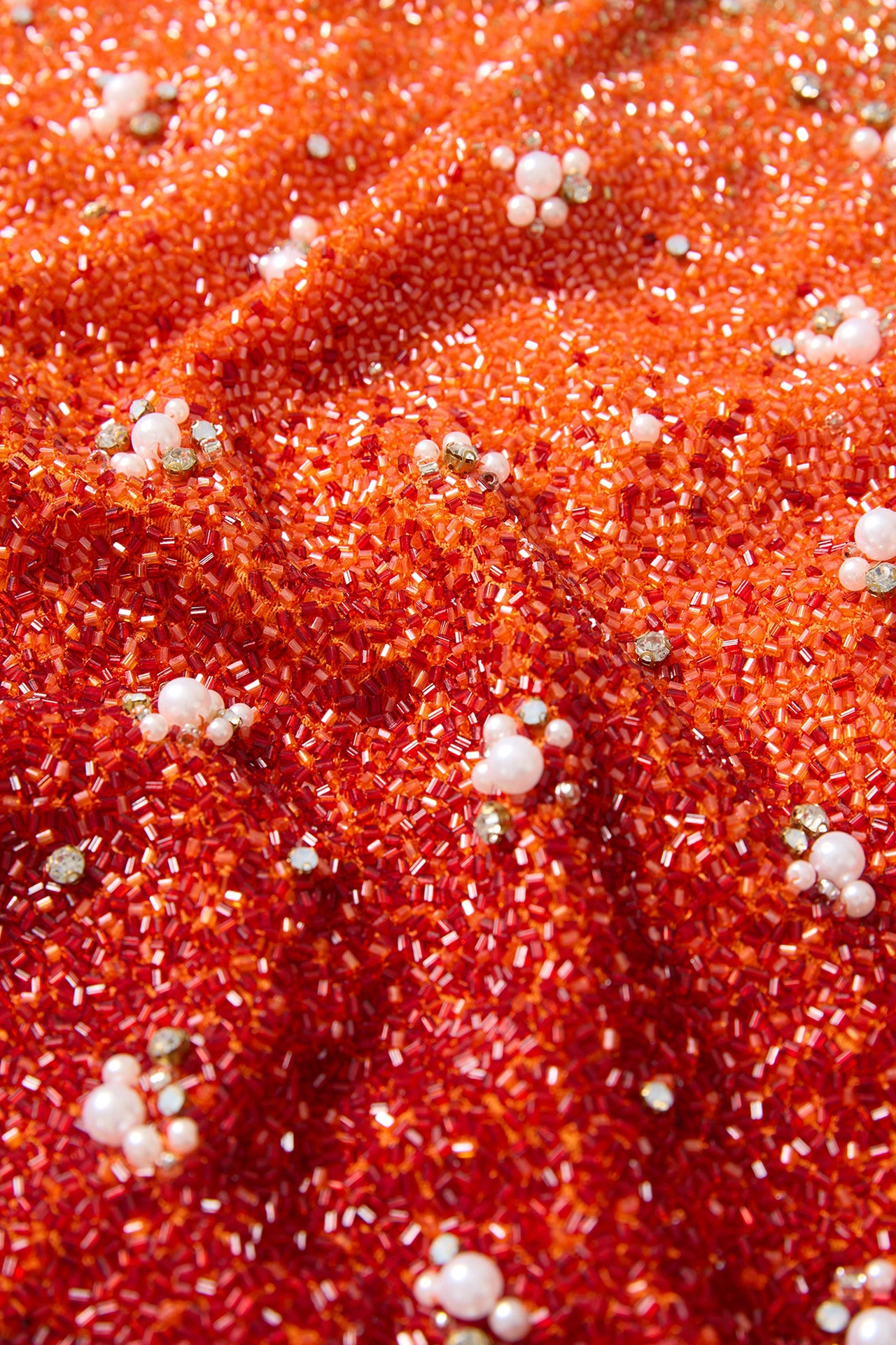 Gradient Mini Phoenix 2.jpg showing premium orange dress with pearl clusters and shiny gold beadwork
