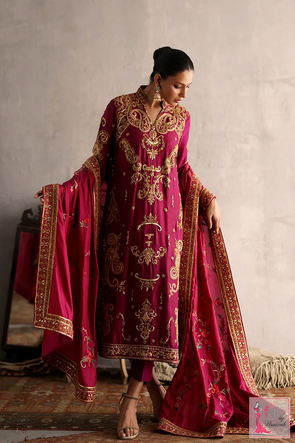 Magenta silk formal dress with heavy gold zardozi neckline work by Fab By Amirah