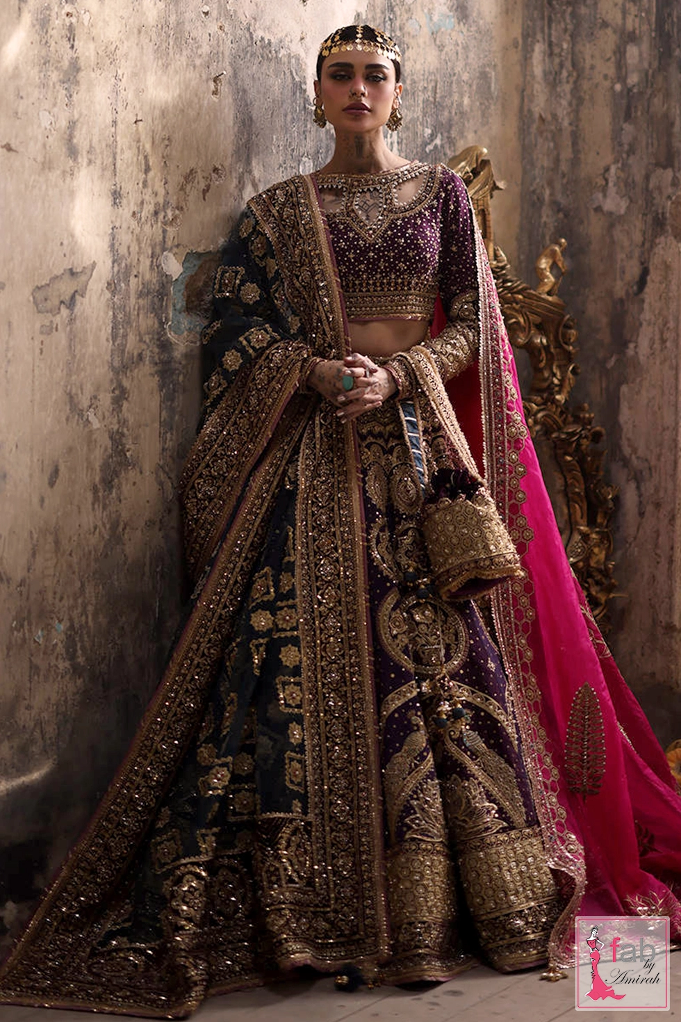 Plum bridal lehenga featuring opulent handwork details by Fab By Amirah