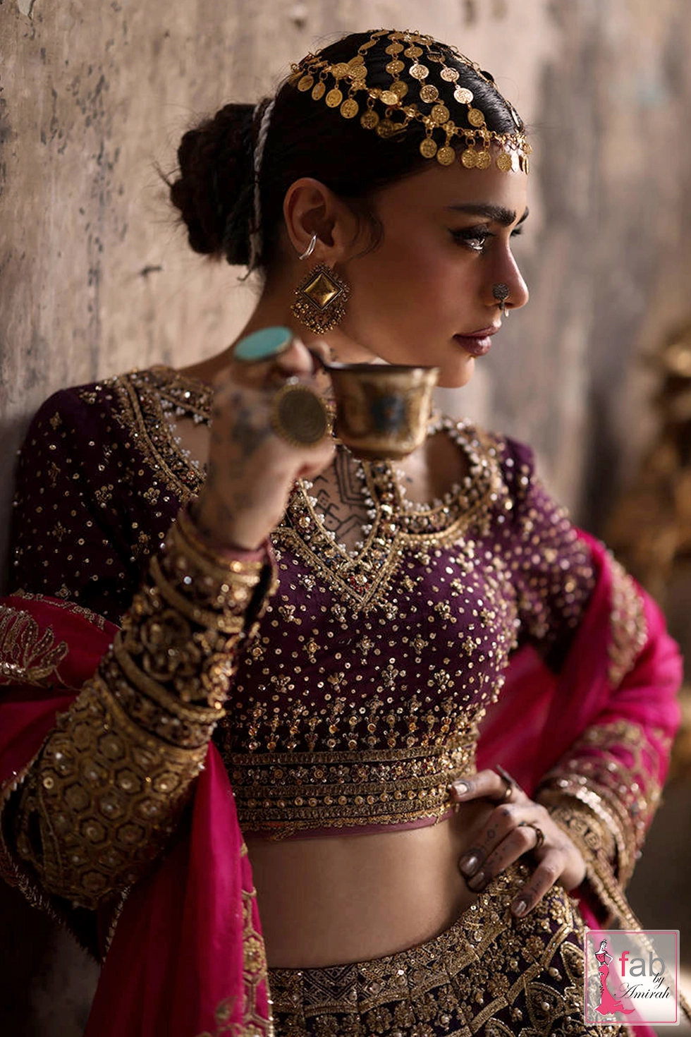 Close-up of intricate cutwork embroidery on Italian silk choli