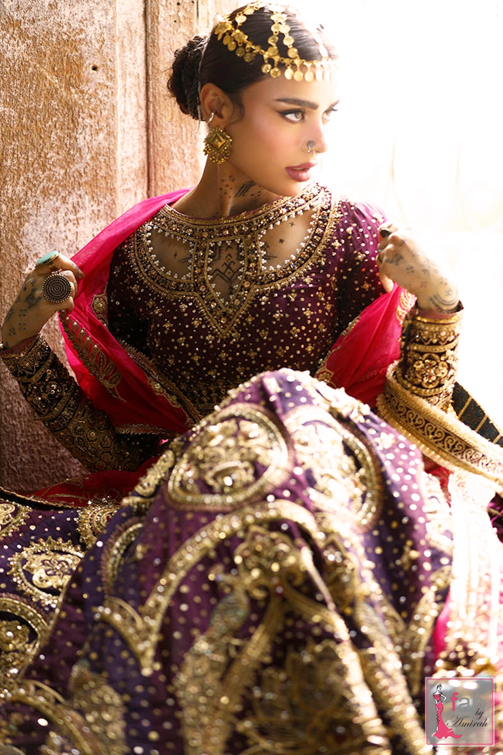 Close-up of intricate cutwork embroidery on Italian silk choli