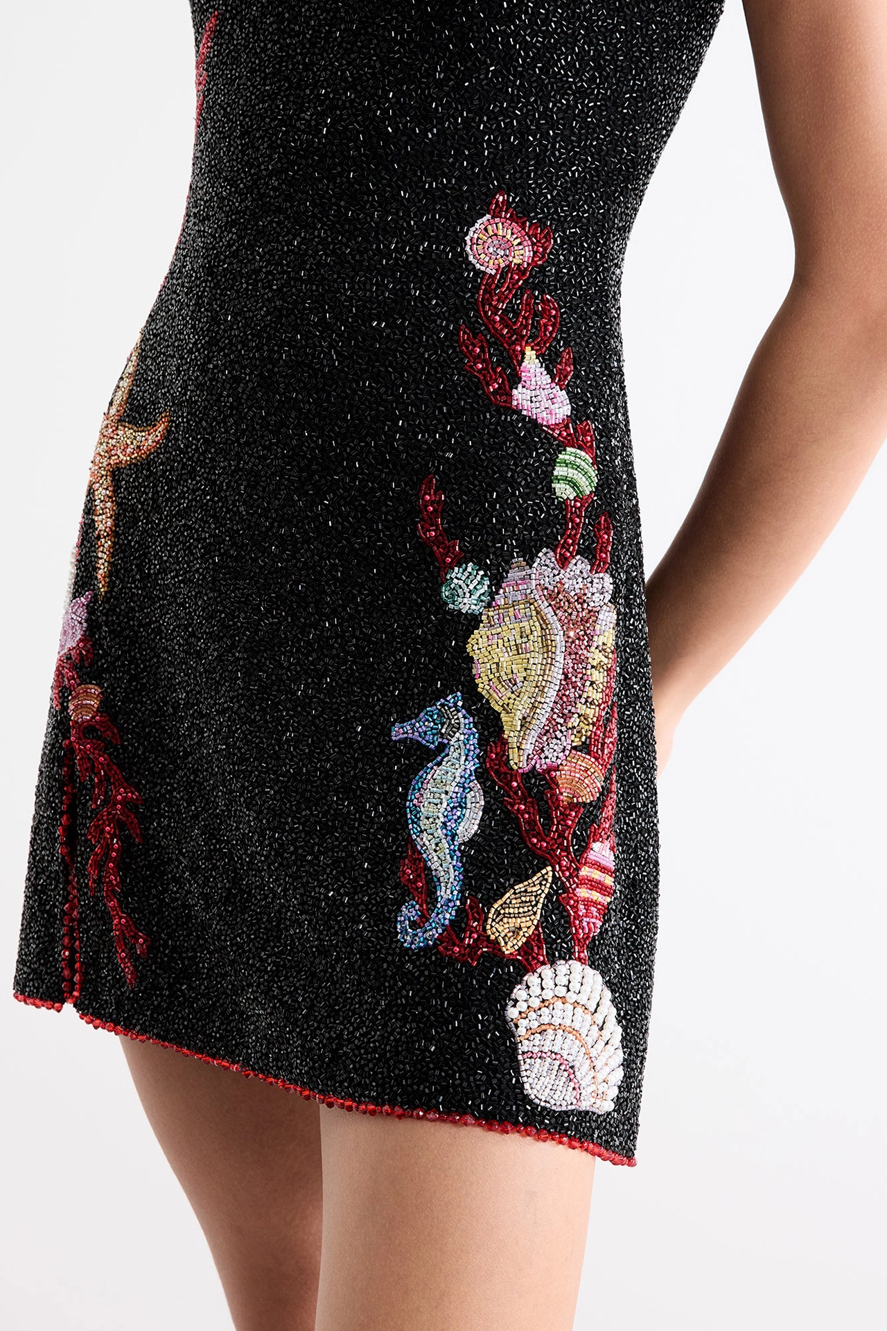 Starfish and seahorse beads on ocean themed party dress from Marina Mini