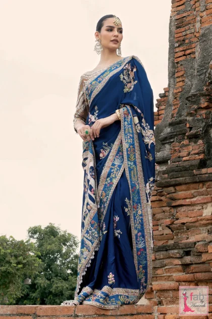 Royal blue silk wedding saree with architectural Mughal borders by Fab By Amirah