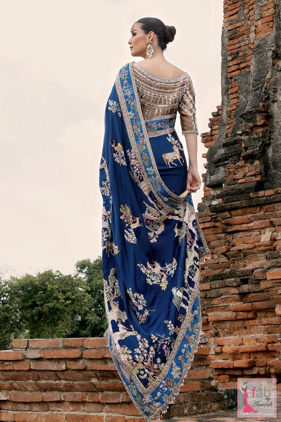Stunning view of silver zardozi detailing on back bodice blouse