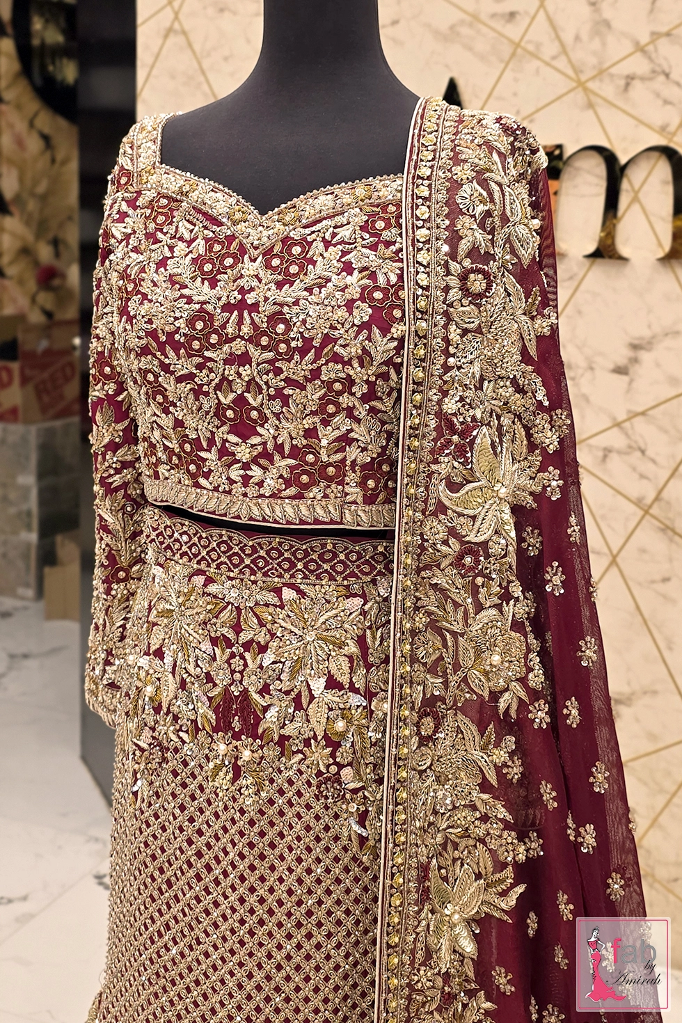 Side view of fishtail mermaid bridal lehenga choli with trail dupatta
