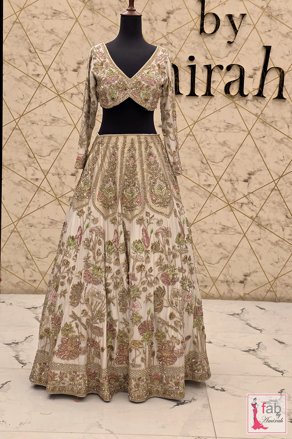 Intricate pastel thread work and silver sequins on full-length bridal sleeves Intricate pastel thread work and silver sequins on full-length bridal sleeves