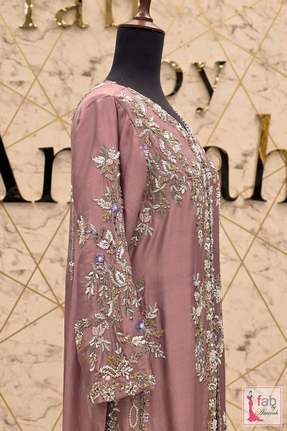 ntricate silver and gold embroidery on full-length luxury formal dress sleeves ntricate silver and gold embroidery on full-length luxury formal dress sleeves
