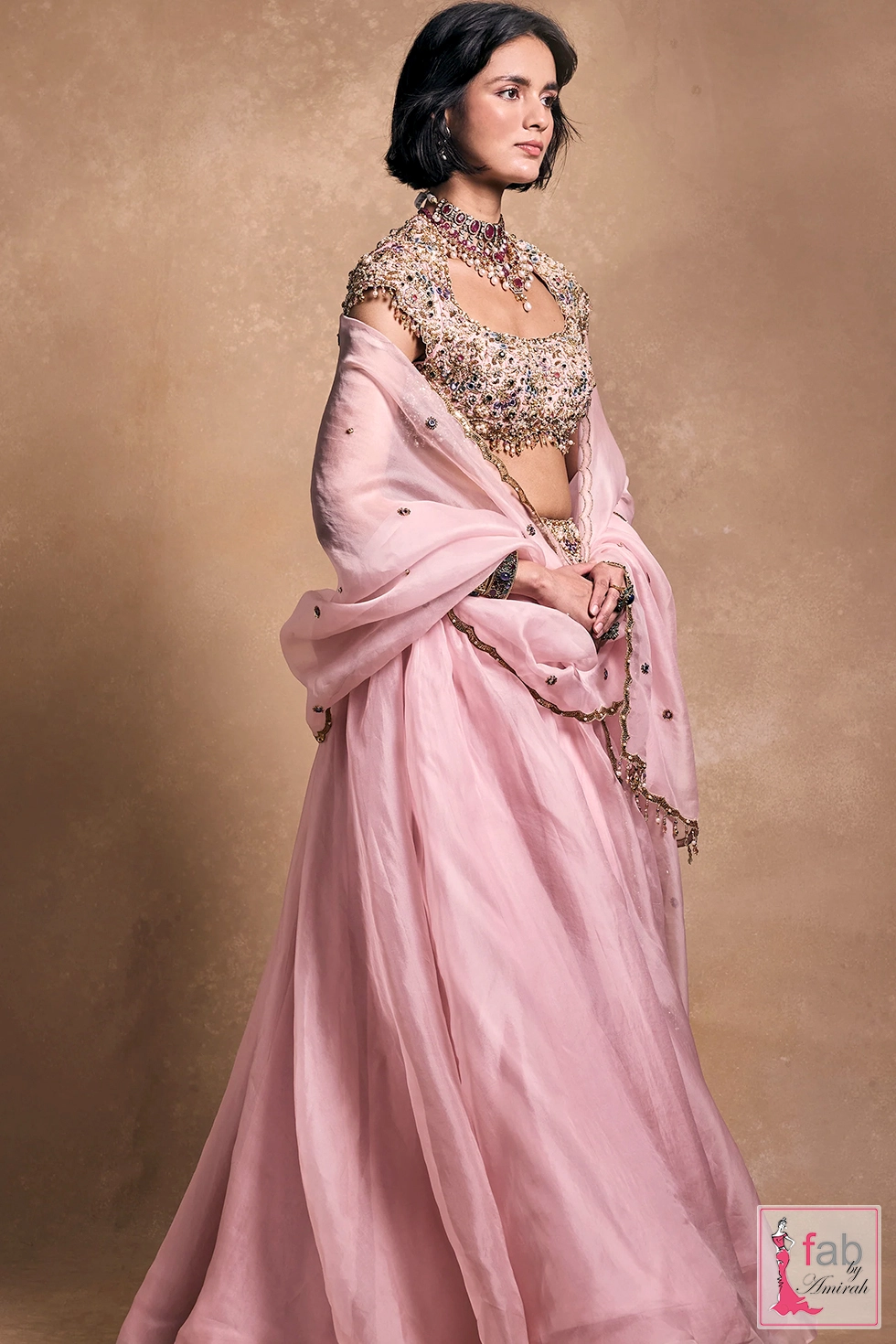Side profile shot showing silhouette and graceful fabric drape Side profile shot showing silhouette and graceful fabric drape