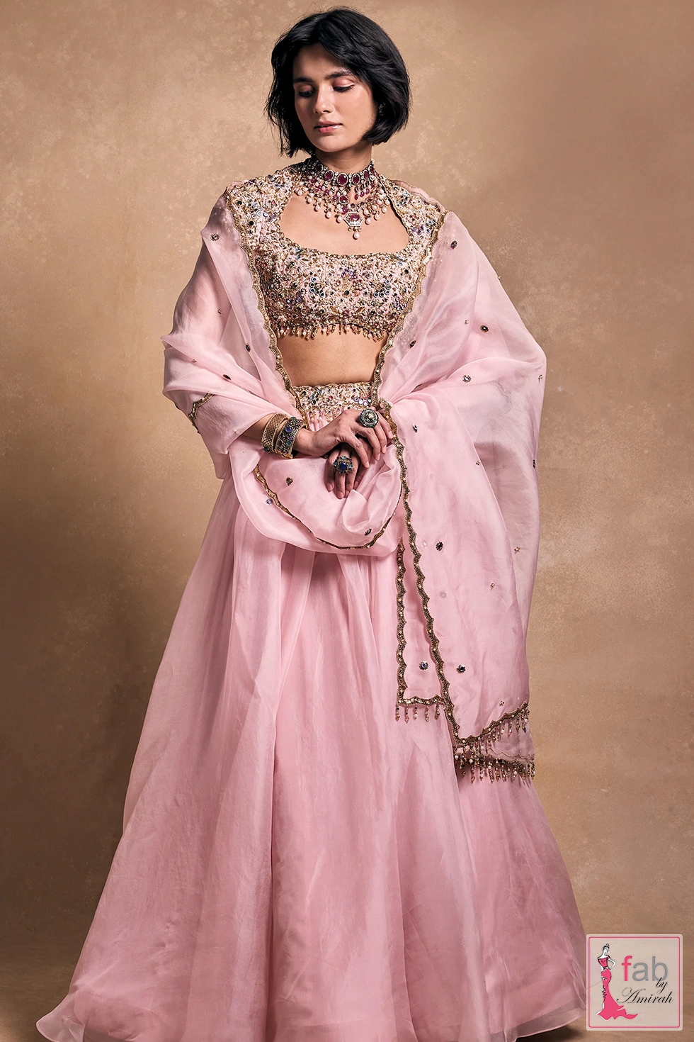 Full outfit front view showcasing the draped dupatta and flared skirt Full outfit front view showcasing the draped dupatta and flared skirt
