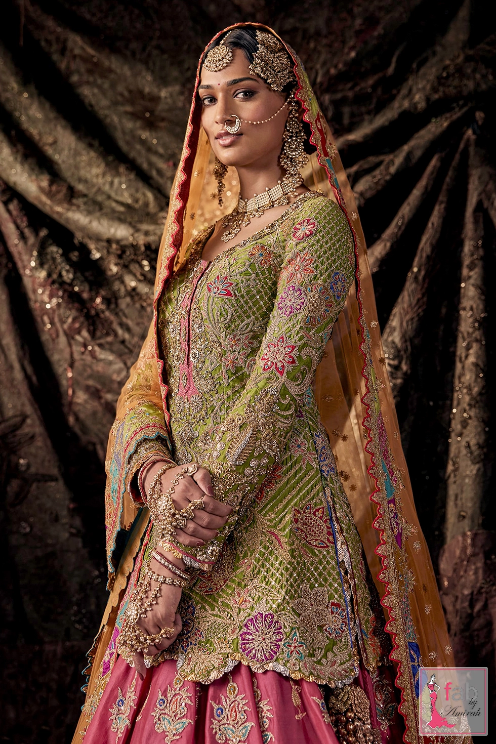 Medium shot showing intricate neckline embellishments and bridal jewelry styling