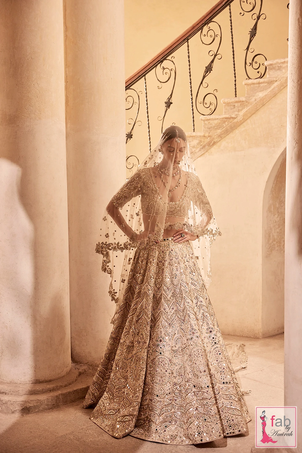 Full pose of champagne lehenga set showing flared skirt silhouette