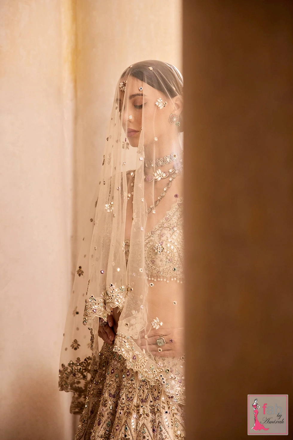 Close up of veil details and hand embellished resham embroidery motifs