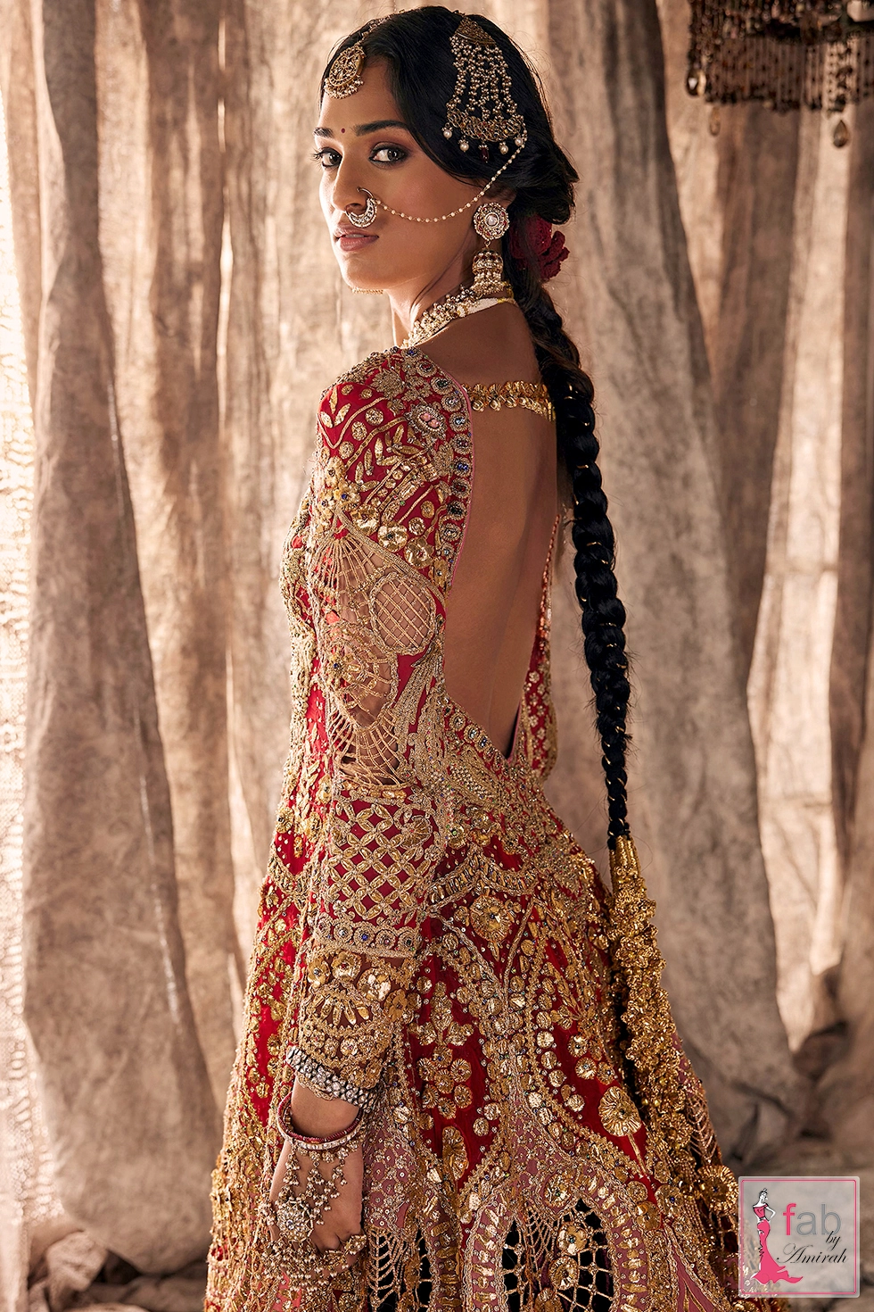 Side profile showing back cutout detail and braided hair ornament