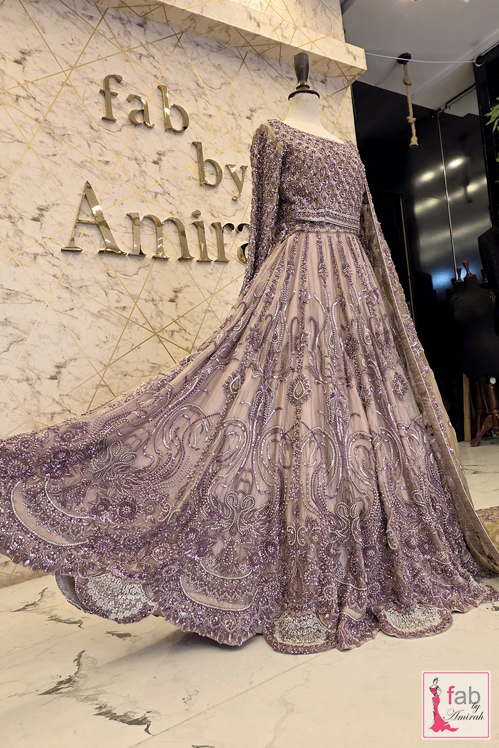 Angle view highlighting wide skirt flare and intricate embroidery