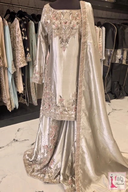 FAB By AMIRAH 4 Silver Sharara Suit with detailed hand embroidery and matching dupatta on display