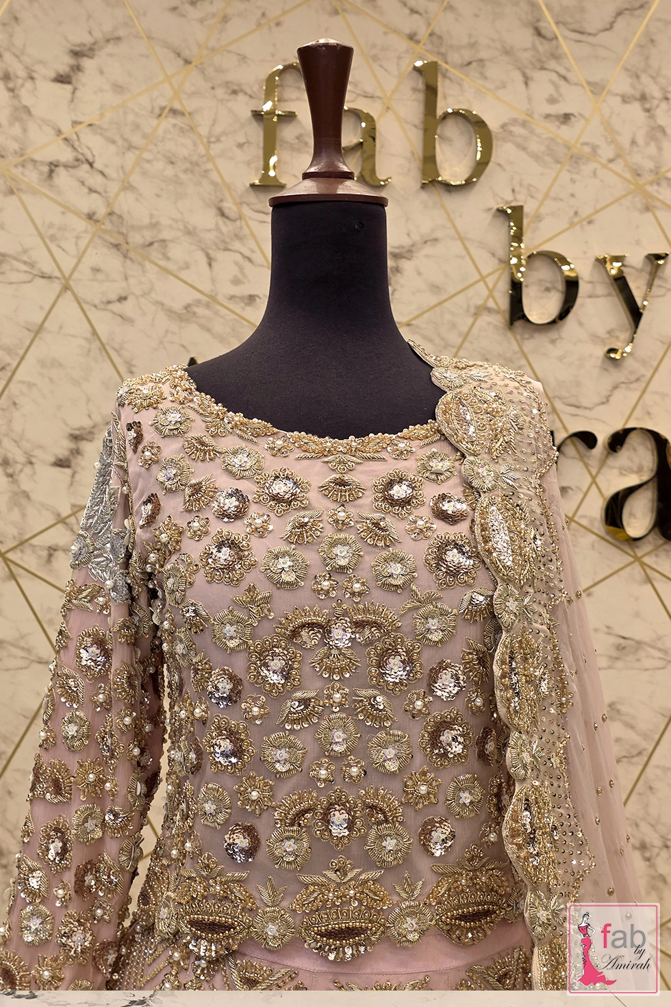 Front upper bodice showing intricate round neck embroidery pattern Front upper bodice showing intricate round neck embroidery pattern