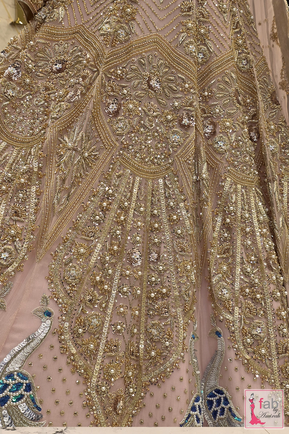Close up of zardozi geometric panel embroidery and pearls Close up of zardozi geometric panel embroidery and pearls