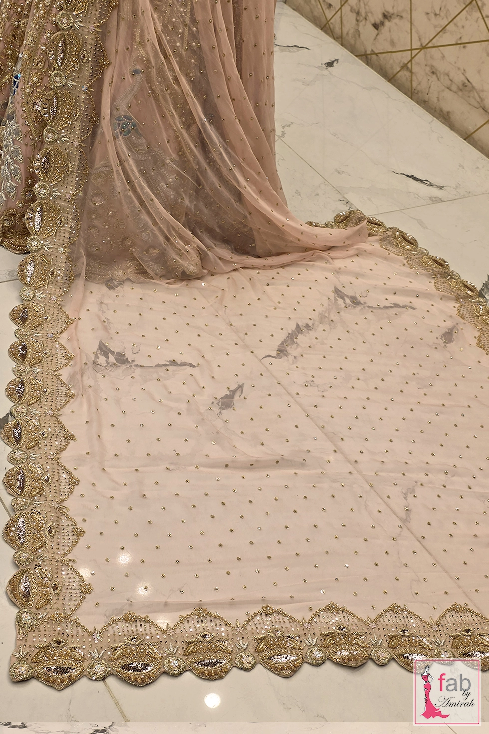 Dupatta layout displaying subtle sparkle scatter and rich border work Dupatta layout displaying subtle sparkle scatter and rich border work