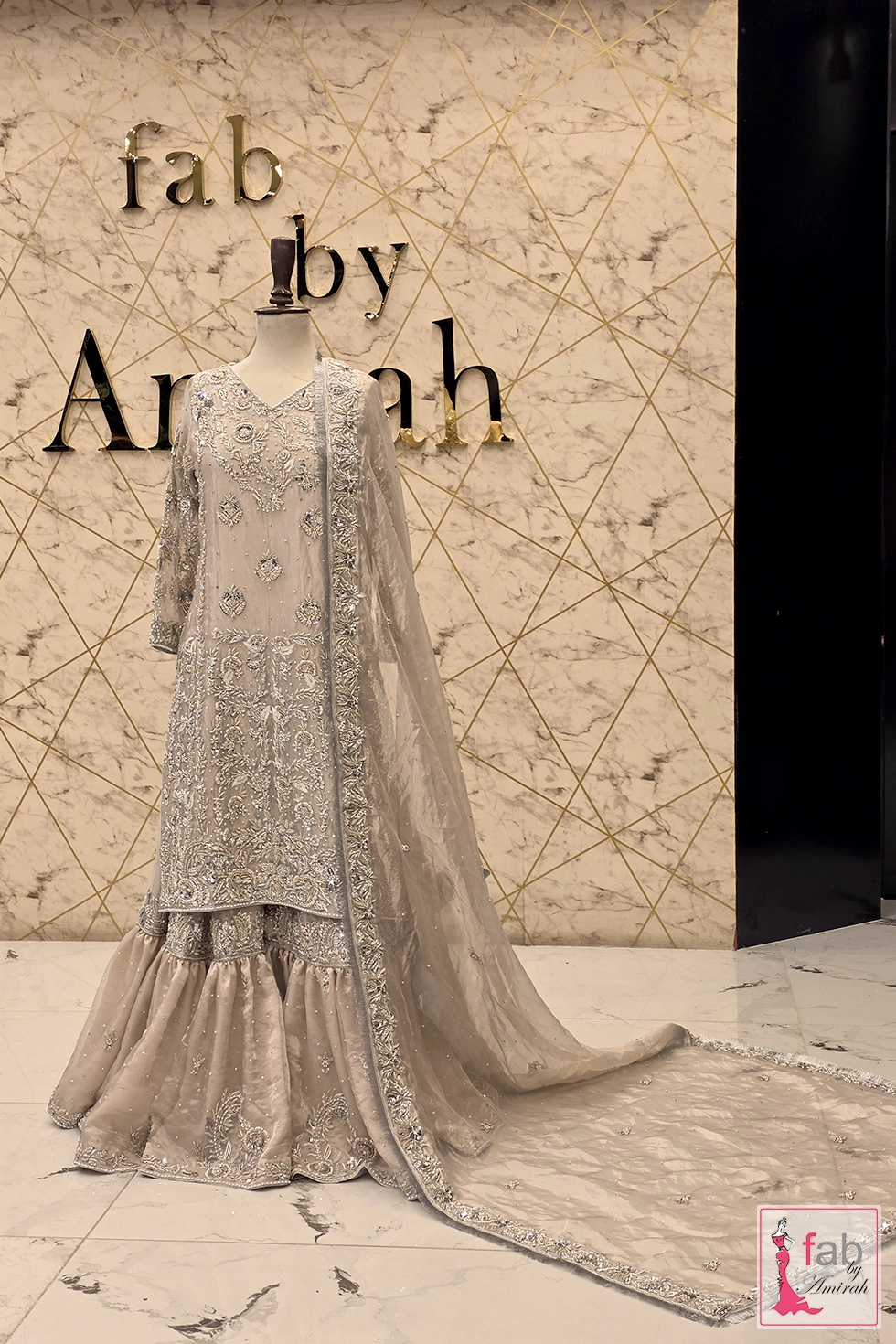 Full length side view of silver formal outfit with sweeping dupatta