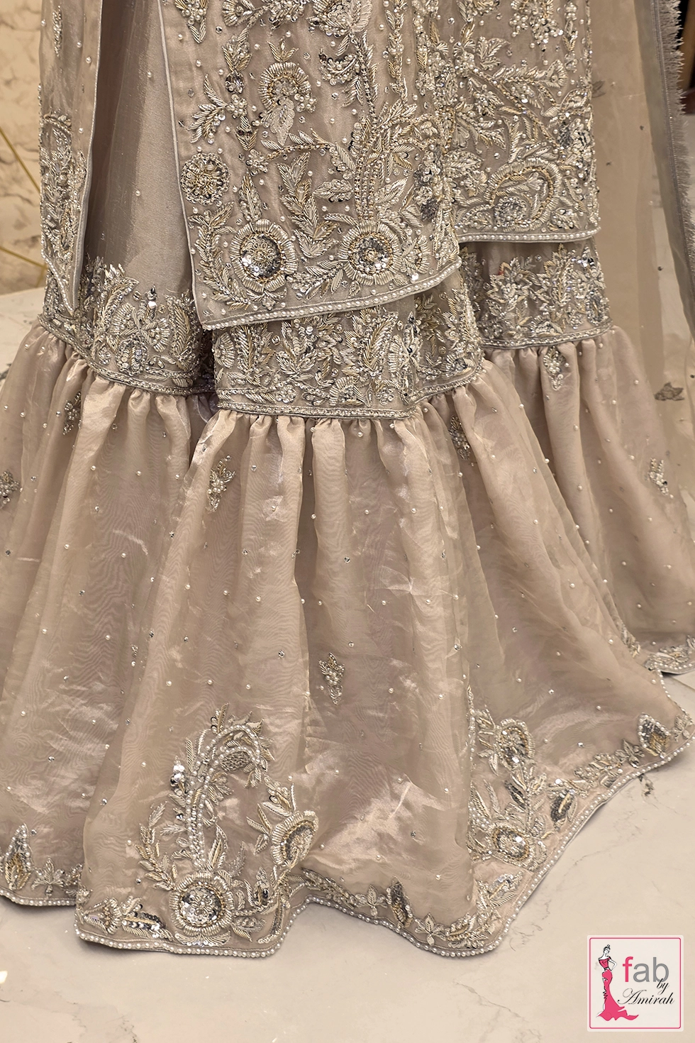 Close up view of two tiered flared gharara bottom hemline