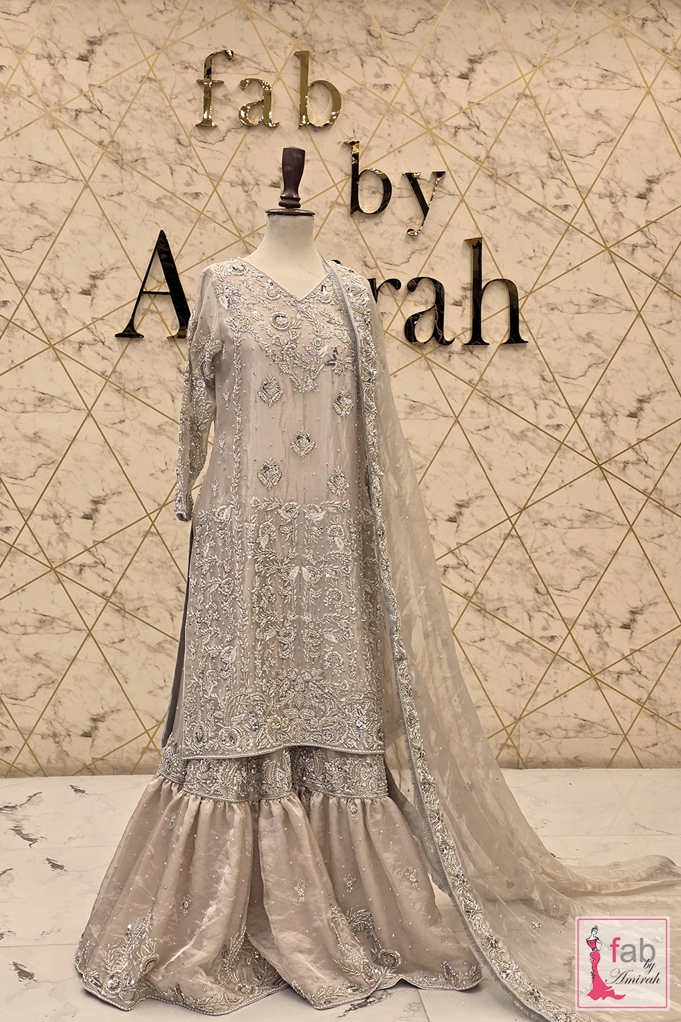 Full length front view showing complete silhouetted flared lower section