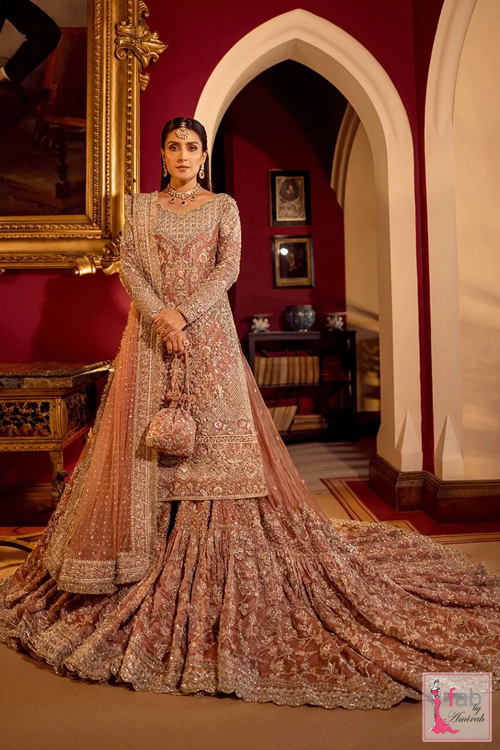 Full length front pose displaying the complete embellished outfit