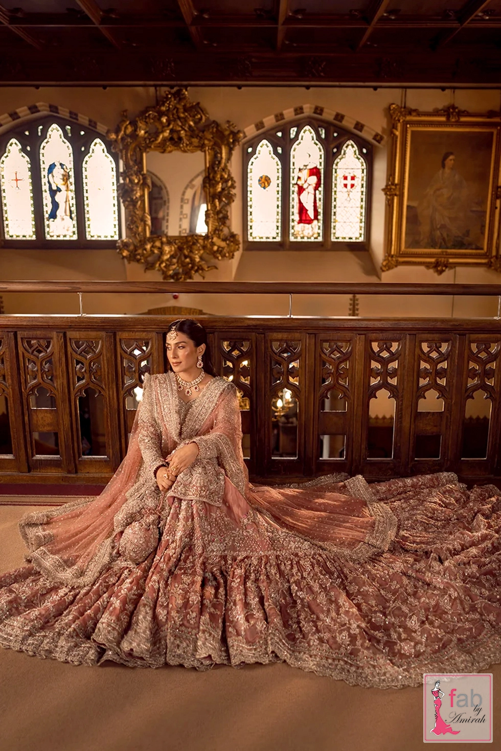 Seated pose showcasing dupatta draping and voluminous gharara flare