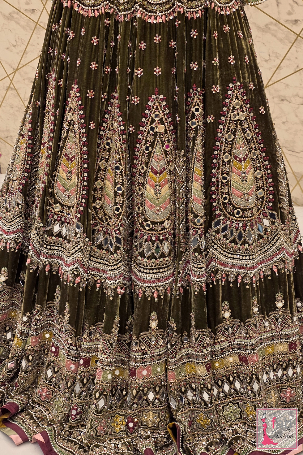 Close up texture view of velvet fabric and mirror work hemline