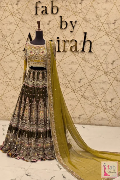 FAB By AMIRAH 6 Olive green velvet lehenga displayed on full mannequin with dupatta draped