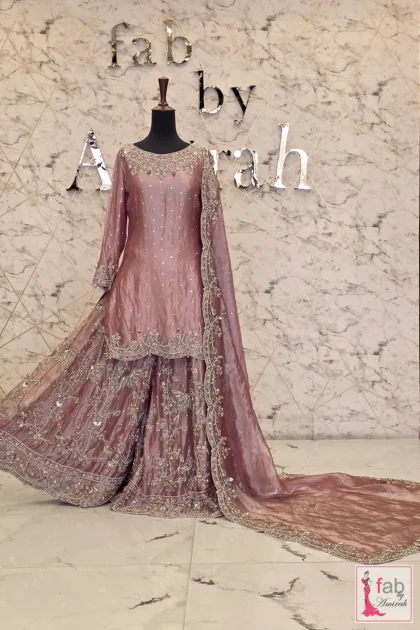 FAB By AMIRAH 4 Full front display of dusty pink sharara suit with trailing organza dupatta.