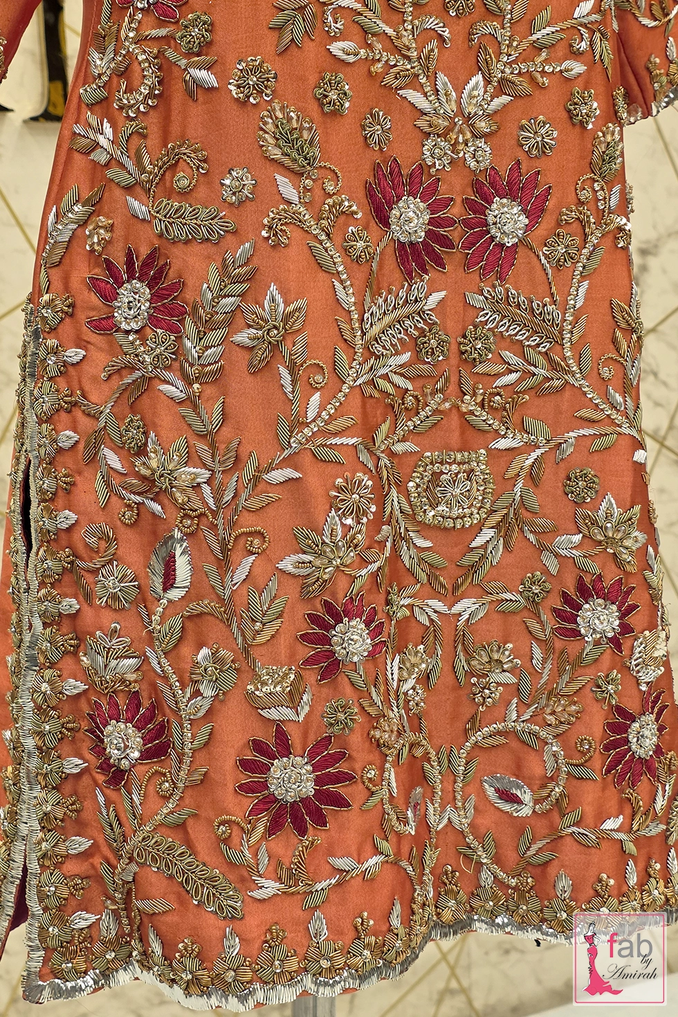 Detailed front bodice photo showing square neckline and central floral motifs Detailed front bodice photo showing square neckline and central floral motifs