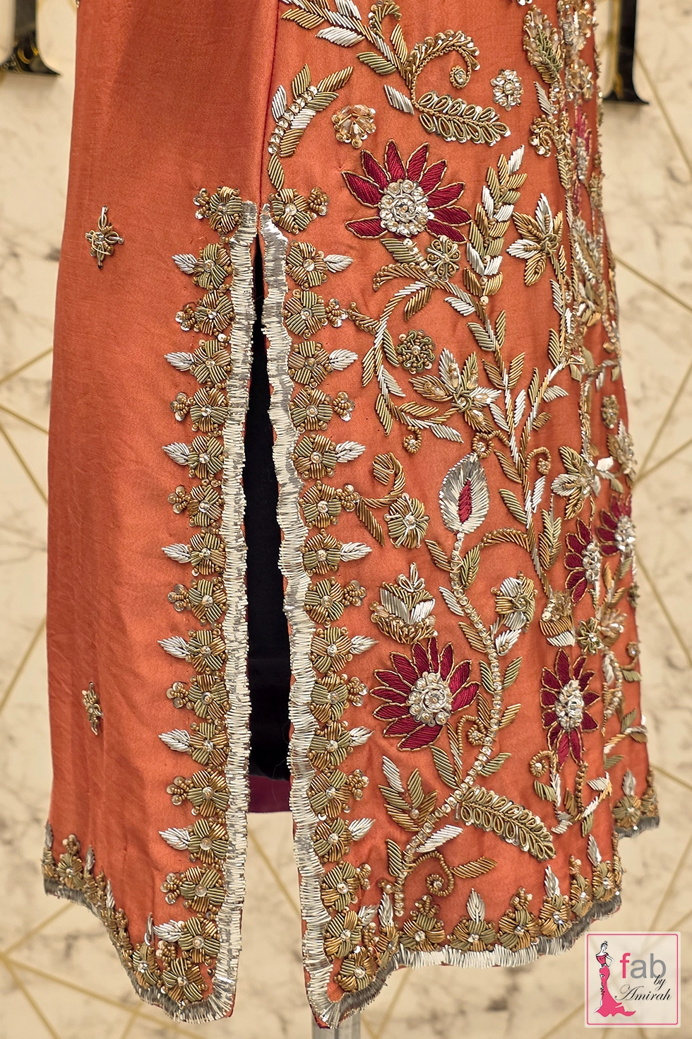 Full front view of embroidered rust short shirt on mannequin Full front view of embroidered rust short shirt on mannequin