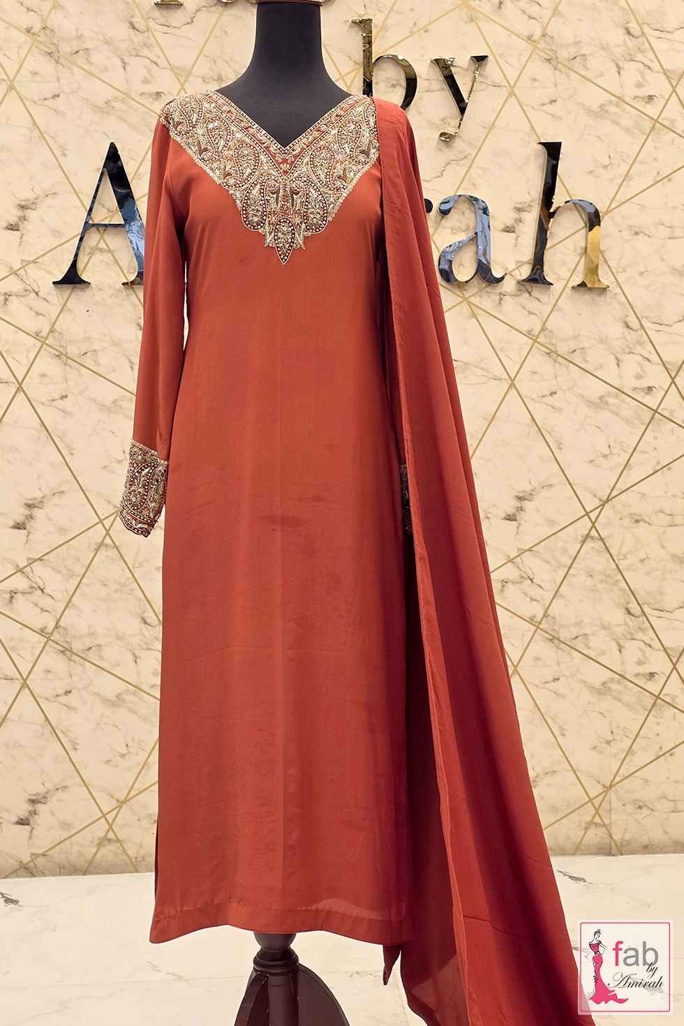 Full length front view of straight rust suit with dupatta