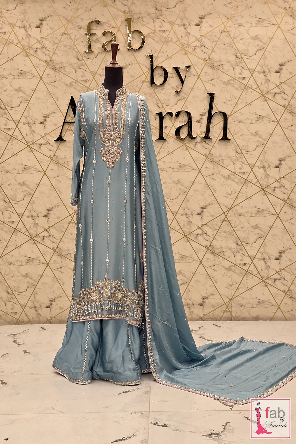 Angle view of the complete outfit on display