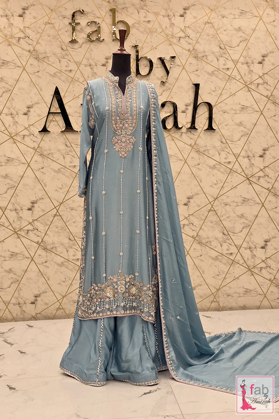 Full view of the dusty blue sharara set with hand embroidered details
