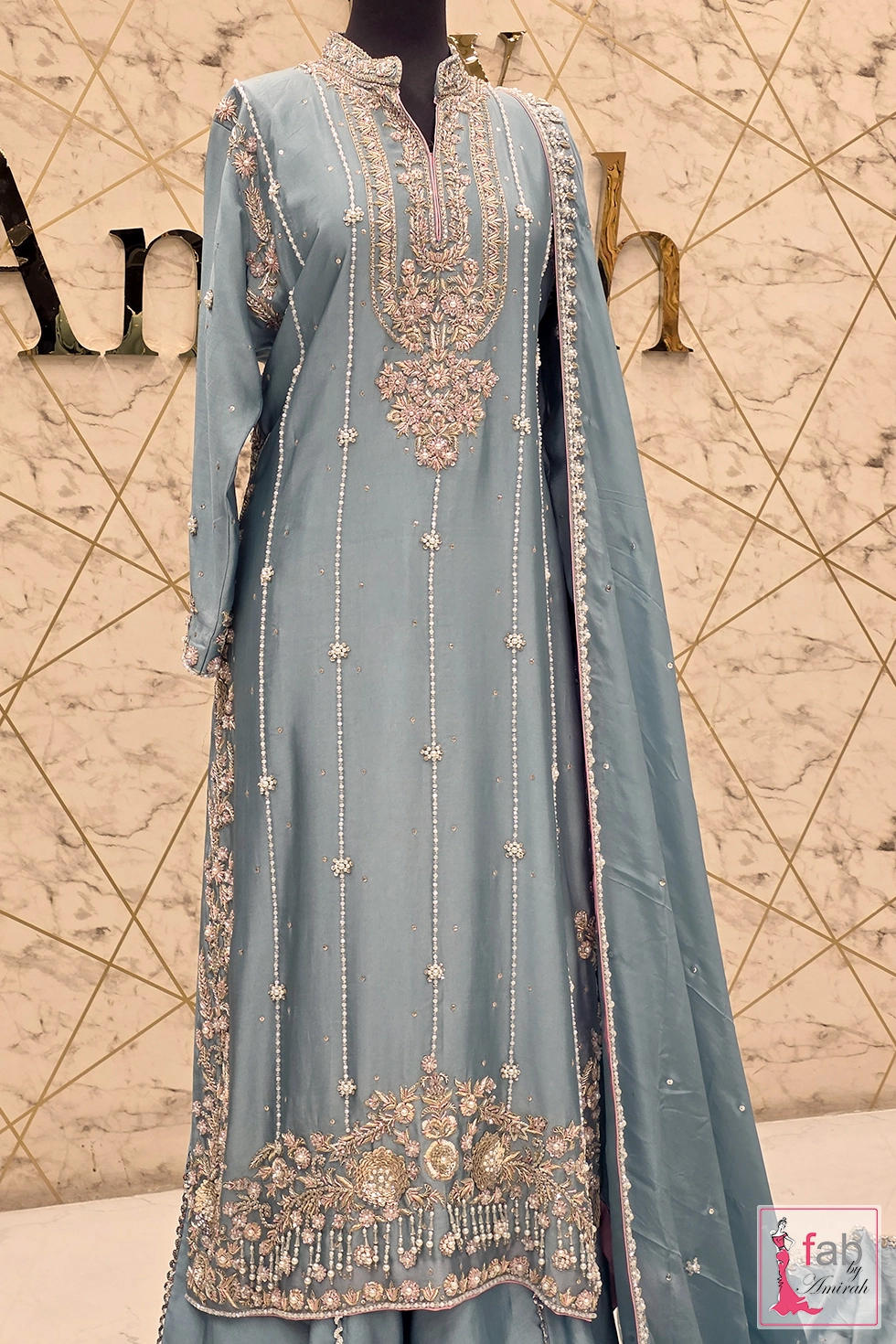 Full length front angle of the embroidered tunic and pants
