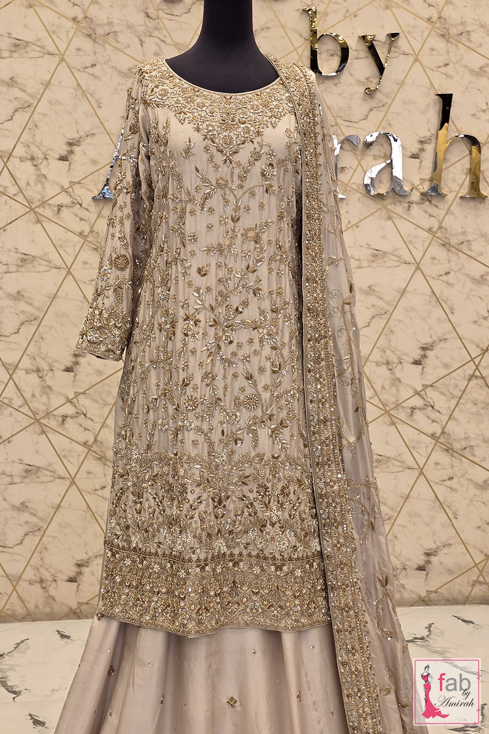Upper body detail of hand embroidered bridal shirt with round neckline