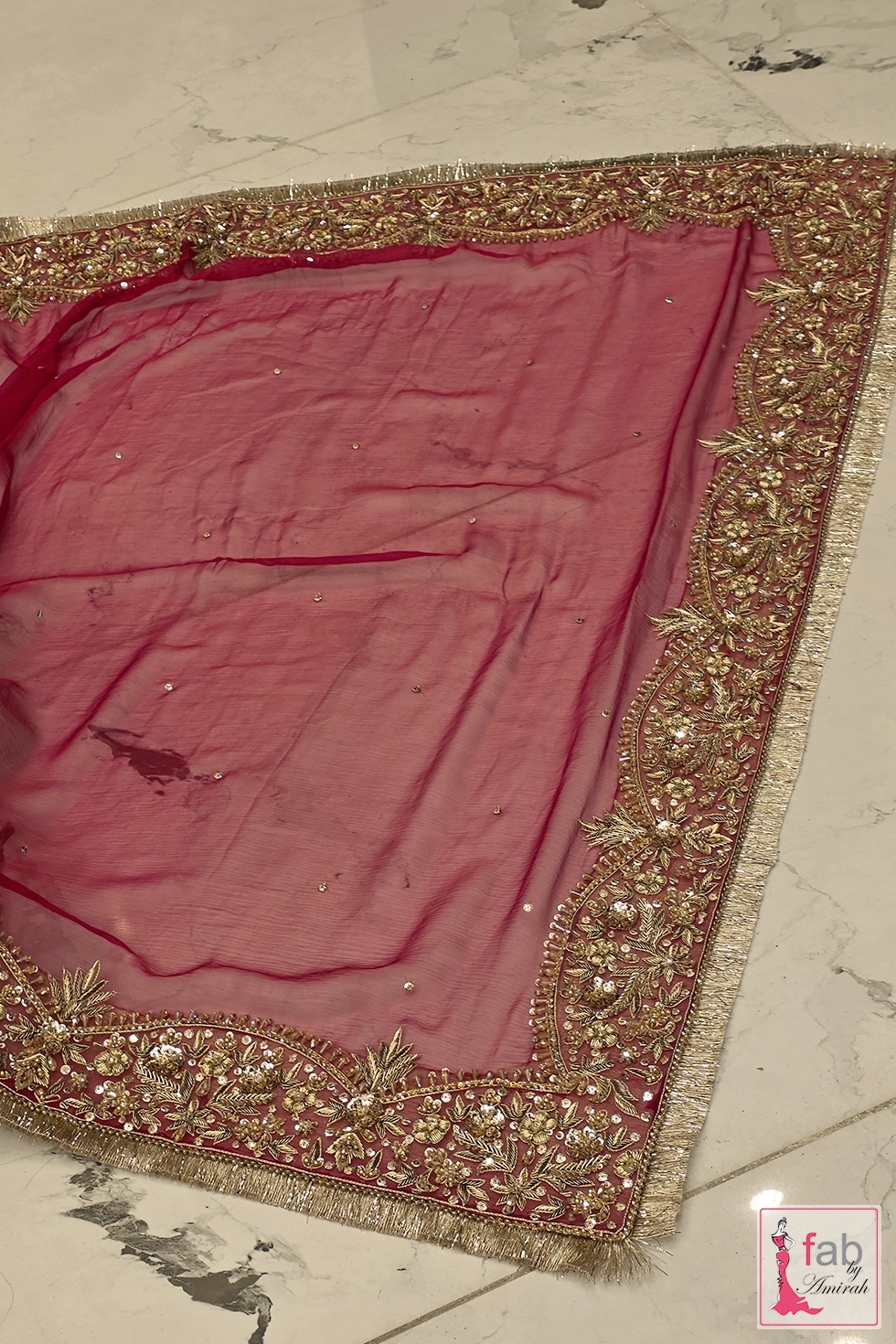 Flat lay view of the sheer net dupatta border embellishments